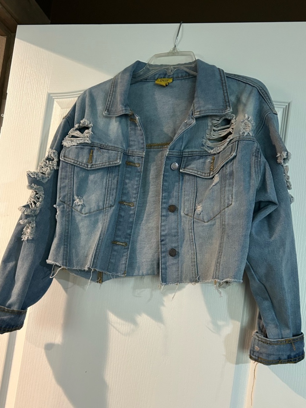 Cropped Distressed Light Wash Denim Jacket